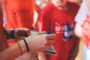 Junior young basketball team with a coach, group of kids children team having training and team...