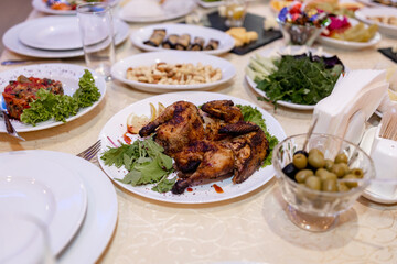 meat and food on the table in the restaurant