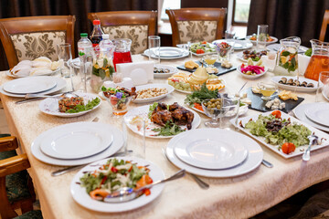 meat and food on the table in the restaurant