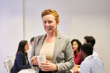 Business woman as boss in meeting with startup team