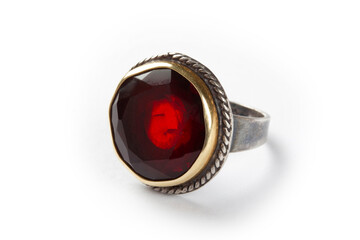 Silver ring with stone on a white background