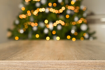  Blurred background without focus with bokeh.
Christmas table background with christmas tree bokeh.