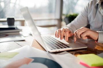 Brainstorming a man works on a computer in an office workplace favorite thing
