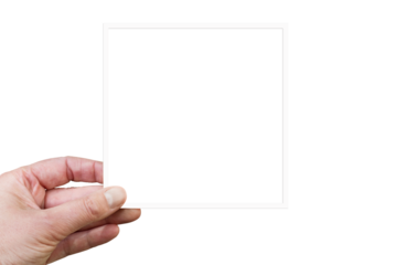 Hand holding a blank square white frame or instant photogrpahy isolated on transparent background