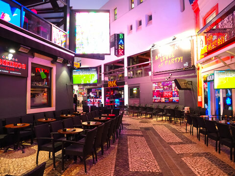 nightlife in Albufeira at the Algarve in Portugal with illuminated bars clubs and restaurants
