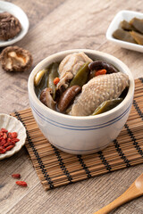 Delicoius Taiwanese peeled green chili pepper chicken soup with mushroom and goji berry.