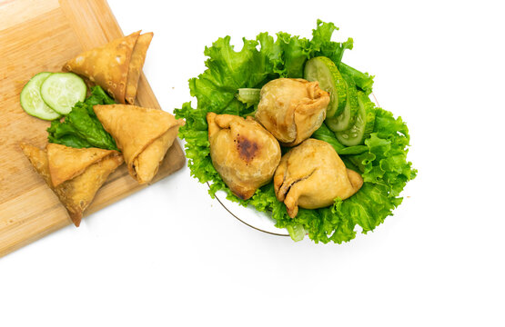 Samosa and singara isolated on white background,