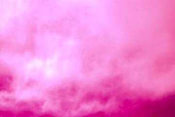 Soft focus of white smoke on pink background