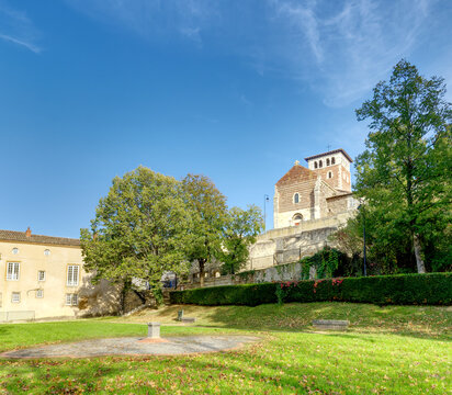Late summer view of Saint Mayol Church in Ternay from park of the historic Maison des Champs of Ternay