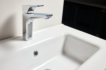 Bathroom interior modern design sink. Interior of bathroom with washbasin and faucet elongated rectangular shape bowl.