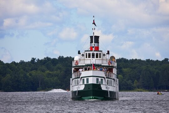 Cruise ship with its passengers enjoying the views of Lake Muskoka in Gravenhurst Ontario
