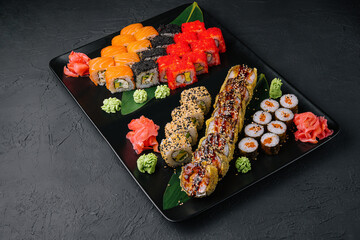 set of colorful different kinds of sushi rolls