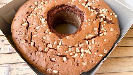 chocolate sponge cake with walnuts topping.