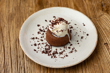 Tasting of chocolate fondant in restaurant.