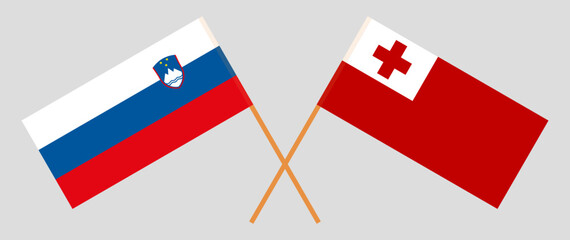 Crossed flags of Slovenia and Tonga. Official colors. Correct proportion