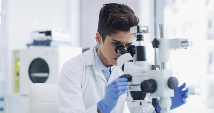 Research, science and microscope with woman in laboratory for vaccine, innovation and medicine. Future, pharmacy and data study with scientist focus on biotechnology, vision, chemistry analytics - Powered by Adobe