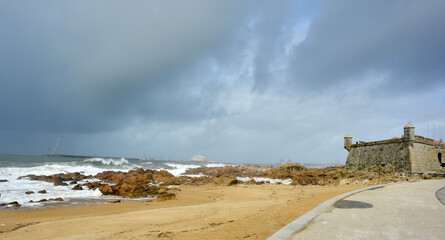 Panorama view of the Fortress Sao Francisco Xavier and beach at the Atlantic ocean in Porto, Portugal