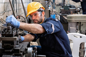 In robotic maintenance repair engineer lathe machine fabricate part and vernier caliper measuring 

