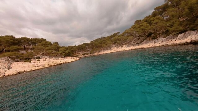 FPV Aerial over the beautiful mediterannean pcean and the french cliffs of Cassis, Marseille, France