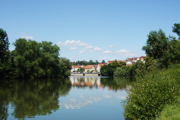 Fototapeta na wymiar The view of the Neckar river embankment in Nuertingen, Germany