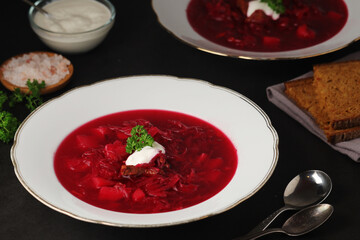 A plate with Ukrainian national dish - borsch
