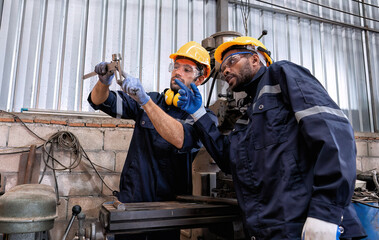 In robotic repair shop engineer use drilling machine fabricate part and vernier caliper measuring