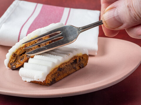 Seasonal festive christmas fruit cake slices with marzepan and white icing
