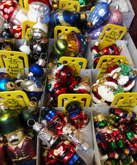 Fototapeta na wymiar Table of unique glass Christmas ornaments 