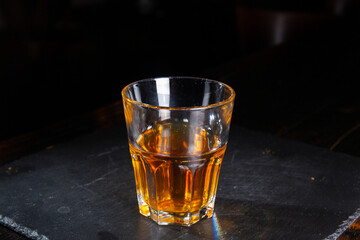 Faceted glass of brandy