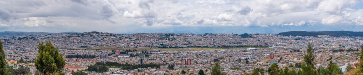 Fototapeta na wymiar The abandoned old airport and cityscape of Quito, the capital of Ecuador
