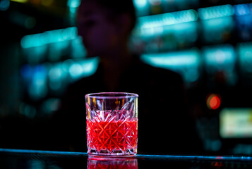 Cocktail Negroni with gin, campari martini rosso and orange. negroni cocktail at the bar