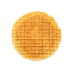 Round waffle isolated on white background. Crispy shortcrust pastry waffle, top view.