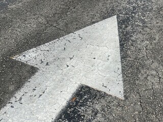 arrow on asphalt