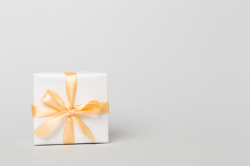 Gift box on color background