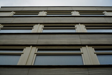 Fototapeta na wymiar Modern building with glass windows high view