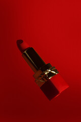 red lipstick on a red background 