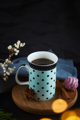 Festive cozy coffee cup with marshmallows with Christmas bokeh. Christmas aesthetics food