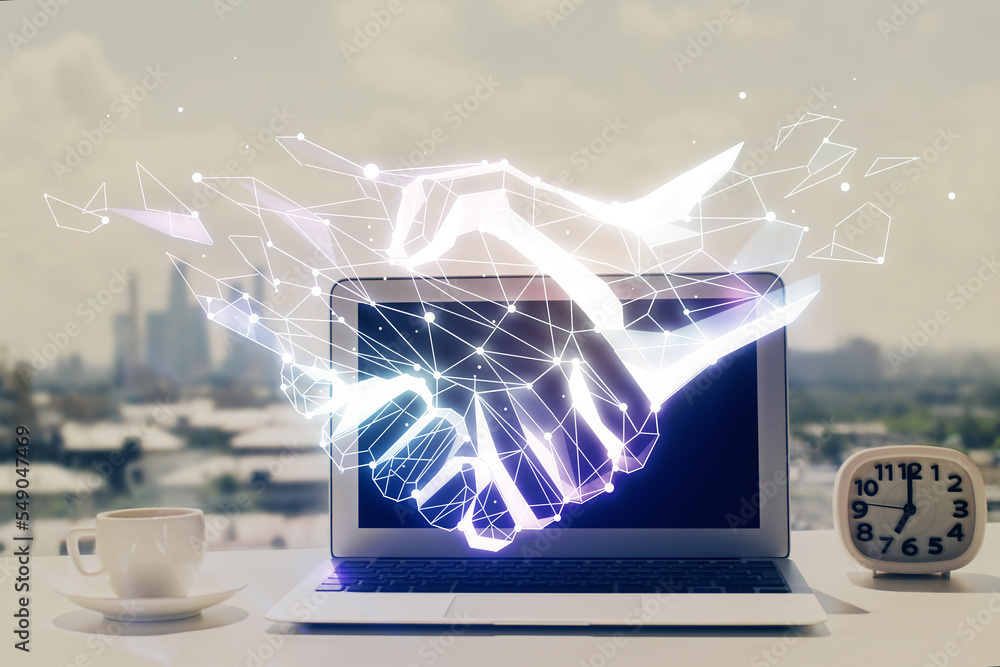 Poster desktop computer background in office and handshake hologram drawing. double exposure. pertnership c