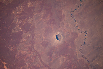 Aerial view of Barringer Impact Crater in Arizona. Digitally enhanced. Elements of this image furnished by NASA. © Bluee