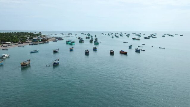 Many fishing boats in Indian harbor Pamban Island. Beautiful Beach of  Danushkodi, Rameswaram Tamil Nadu India Sri Lnaka.