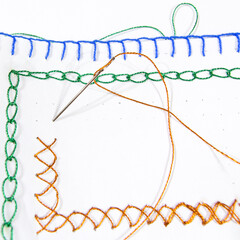 The closeup sewing process of making the colorful card during school activities. An ideal DIY stitch with needle and thread exercise for children.
Art class idea for a creative project.