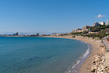 Tarragona beach Spain Platja del Miracle with blue Mediterranean sea