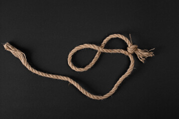 Linen rope on a black background.