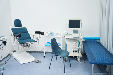 Empty gynecology room with modern equipment in clinic