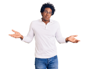 Handsome african american man with afro hair wearing casual clothes and glasses clueless and confused with open arms, no idea concept.
