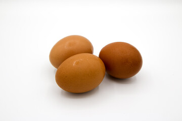 Raw egg on a white background