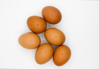 Raw egg on a white background
