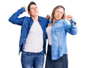 Couple of women wearing casual clothes stretching back, tired and relaxed, sleepy and yawning for early morning