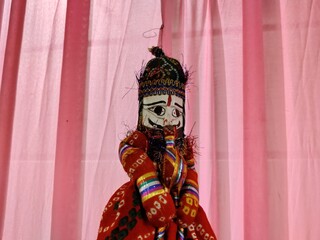 Picture of very colorful rajasthani puppets in market for sale. Traditional puppet show in...