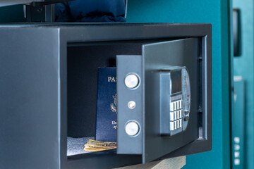 A hotel safe with valuables like passports and money. .